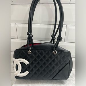 CHANEL
Calfskin Quilted Cambon Bowler bag in black